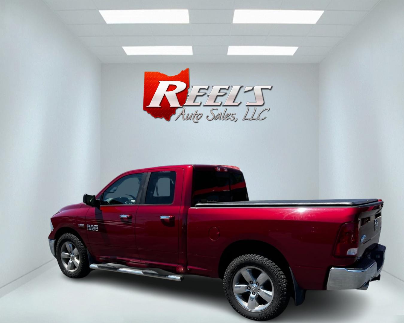 2014 Red /Gray RAM 1500 Big Horn Quad Cab 4WD (1C6RR7GT4ES) with an 5.7L V8 OHV 16V engine, 8-Speed Automatic transmission, located at 547 E. Main St., Orwell, OH, 44076, (440) 437-5893, 41.535435, -80.847855 - This 2014 Ram 1500 Big Horn Quad Cab is a versatile and powerful pickup truck. It features a robust 5.7L HEMI V8 engine producing 395 HP and 410 lb-ft of torque, paired with an efficient 8-speed automatic transmission. The 4WD system, 3.21 gearing, and limited-slip rear differential provide excellen - Photo#8