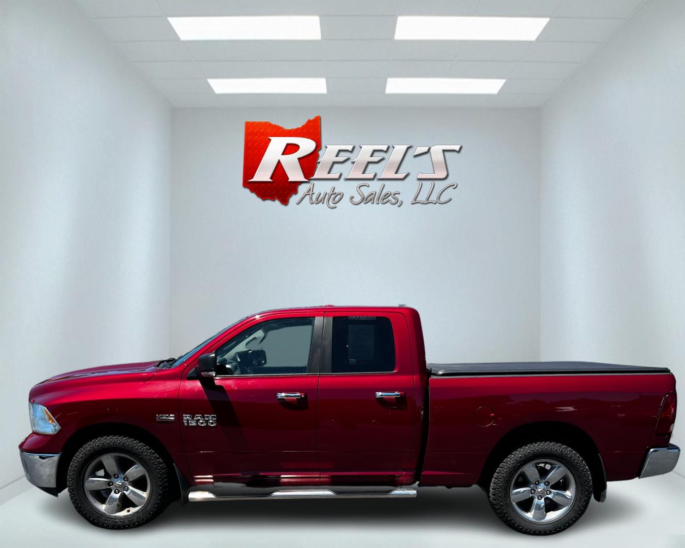 2014 Red /Gray RAM 1500 Big Horn Quad Cab 4WD (1C6RR7GT4ES) with an 5.7L V8 OHV 16V engine, 8-Speed Automatic transmission, located at 547 E. Main St., Orwell, OH, 44076, (440) 437-5893, 41.535435, -80.847855 - This 2014 Ram 1500 Big Horn Quad Cab is a versatile and powerful pickup truck. It features a robust 5.7L HEMI V8 engine producing 395 HP and 410 lb-ft of torque, paired with an efficient 8-speed automatic transmission. The 4WD system, 3.21 gearing, and limited-slip rear differential provide excellen - Photo#9