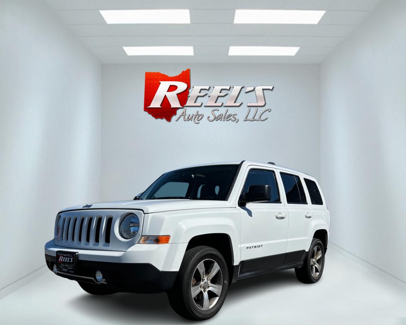 2016 White /Black Jeep Patriot High Altitude 4WD (1C4NJRFB4GD) with an 2.4L I4 DOHC 16V engine, 6-Speed Automatic transmission, located at 11115 Chardon Rd. , Chardon, OH, 44024, (440) 214-9705, 41.580246, -81.241943 - This 2016 Jeep Patriot High Altitude 4WD is a well-equipped compact SUV offering a blend of comfort and capability. It's powered by a 2.4L Multiair engine paired with a 6-speed automatic transmission, providing a balance of performance and efficiency with 26 MPG on the highway. The 4WD system with a - Photo#0