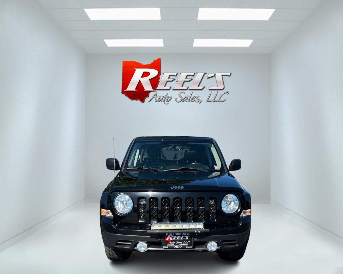 2017 Black /Black Jeep Patriot High Altitude 4WD (1C4NJRFB3HD) with an 2.4L I4 DOHC 16V engine, 6-Speed Automatic transmission, located at 547 E. Main St., Orwell, OH, 44076, (440) 437-5893, 41.535435, -80.847855 - This 2017 Jeep Patriot High Altitude is a well-equipped compact SUV that combines comfort, technology, and off-road capability. It features a 2.4L Multi Air engine paired with a 6-speed automatic transmission, offering a balance of performance and efficiency. The interior boasts leather upholstery, - Photo#1