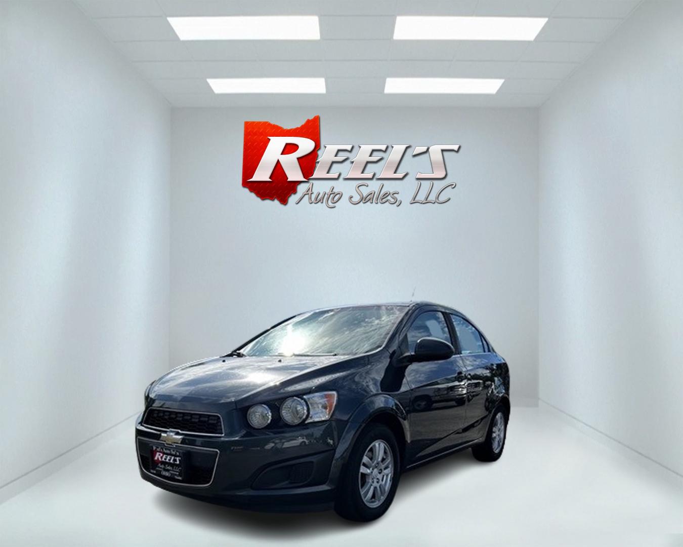 2014 Gray /Black Chevrolet Sonic LT Auto Sedan (1G1JC5SH6E4) with an 1.8L I4 DOHC 16V engine, 6-Speed Automatic transmission, located at 547 E. Main St., Orwell, OH, 44076, (440) 437-5893, 41.535435, -80.847855 - This 2014 Chevrolet Sonic LT Sedan is a compact car that offers a blend of efficiency and convenience features. It's powered by a 1.8-liter EcoTec engine paired with a 6-speed automatic transmission, providing a balance of performance and fuel economy with an impressive 34 MPG on the highway. The ve - Photo#0