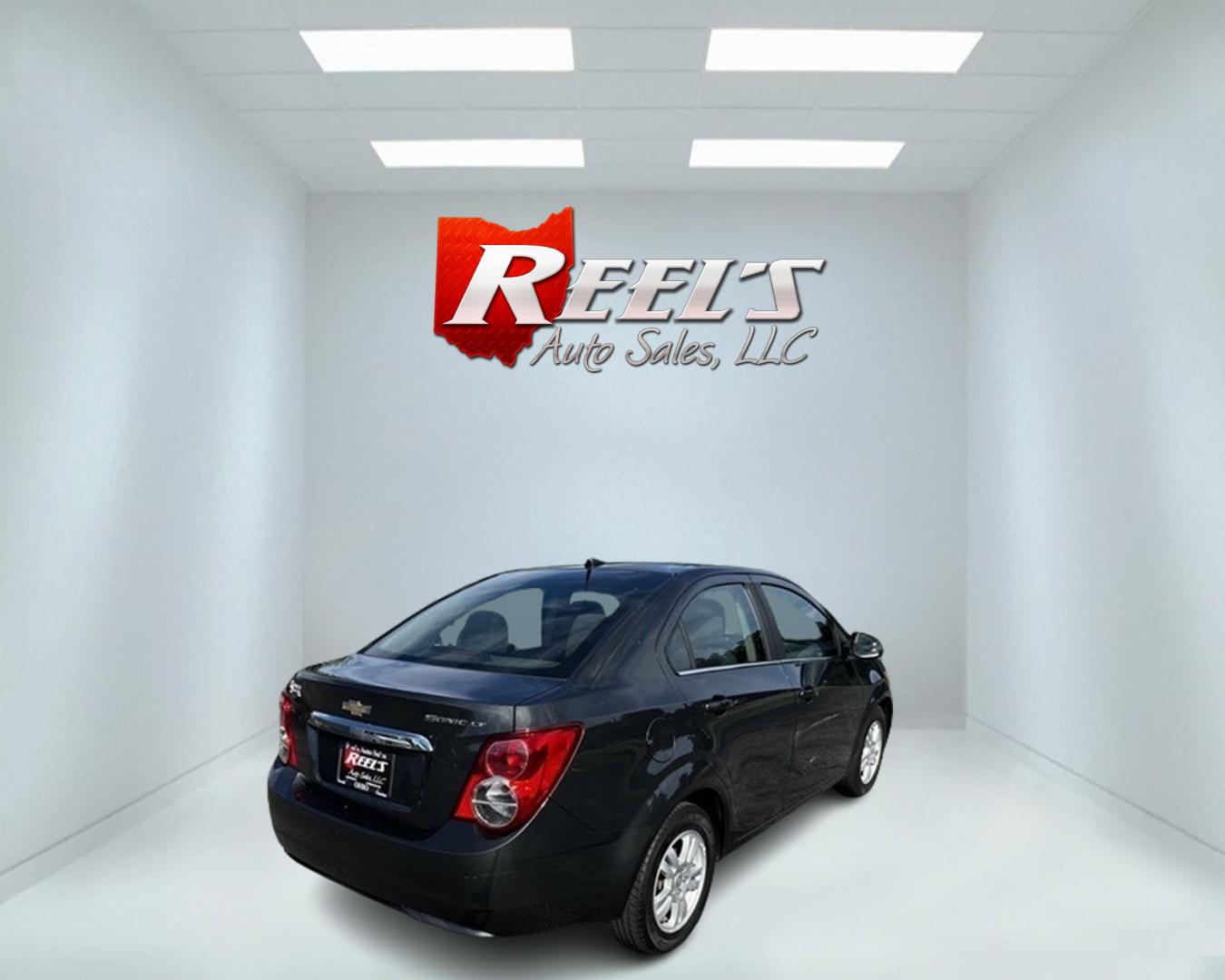 2014 Gray /Black Chevrolet Sonic LT Auto Sedan (1G1JC5SH6E4) with an 1.8L I4 DOHC 16V engine, 6-Speed Automatic transmission, located at 547 E. Main St., Orwell, OH, 44076, (440) 437-5893, 41.535435, -80.847855 - Photo#4