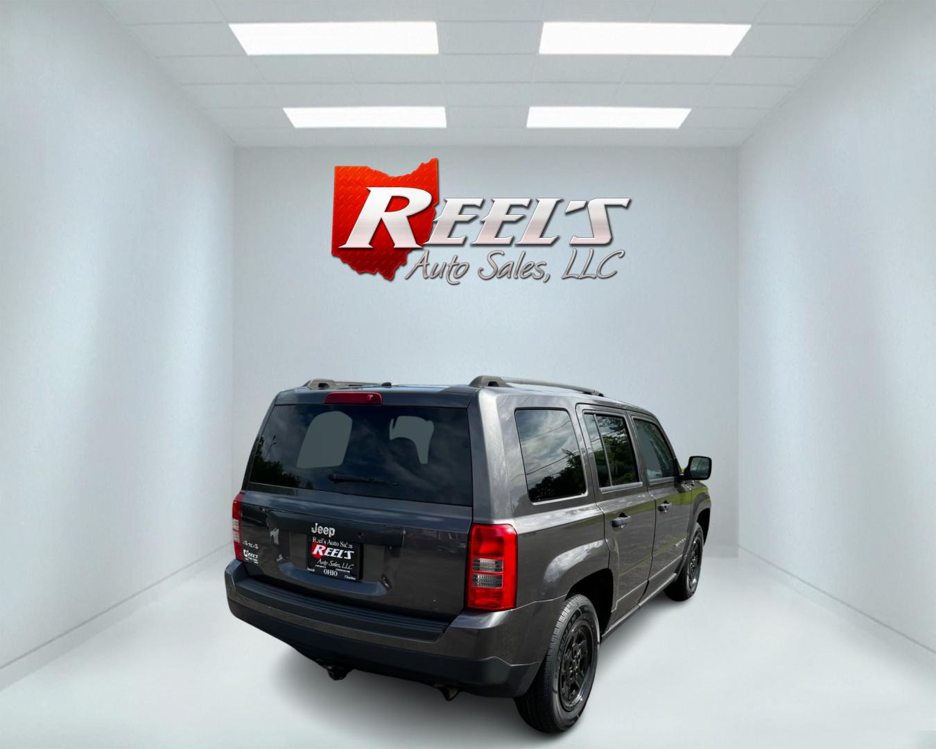 2016 Gray /Black Jeep Patriot Sport 4WD (1C4NJRBB3GD) with an 2.4L I4 DOHC 16V engine, 6-Speed Automatic transmission, located at 11115 Chardon Rd. , Chardon, OH, 44024, (440) 214-9705, 41.580246, -81.241943 - This 2016 Jeep Patriot Sport 4WD is a reliable and rugged vehicle, perfect for those who need a capable off-road companion. Equipped with a 2.4L I4 engine and 6-speed automatic transmission, it offers a smooth ride on both paved roads and rough terrain. The aux audio input allows for easy connection - Photo#5