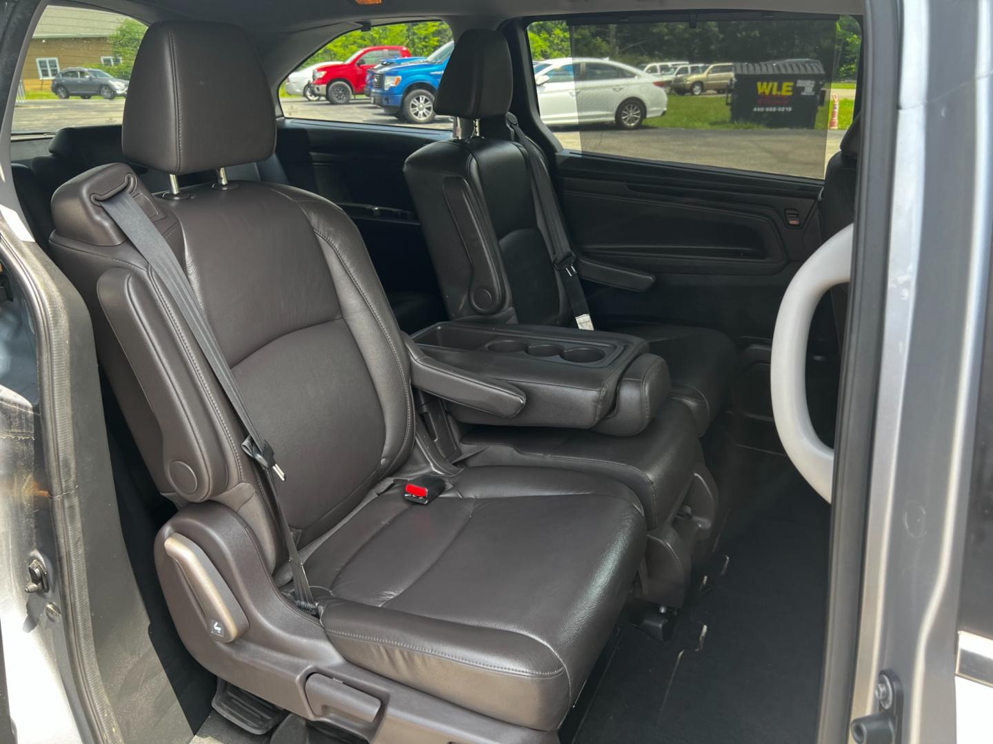 2018 Gray /Brown Honda Odyssey EXL DVD Nav (5FNRL6H7XJB) with an 3.5L V6 SOHC 24V engine, 9-Speed Automatic transmission, located at 11115 Chardon Rd. , Chardon, OH, 44024, (440) 214-9705, 41.580246, -81.241943 - Photo#42