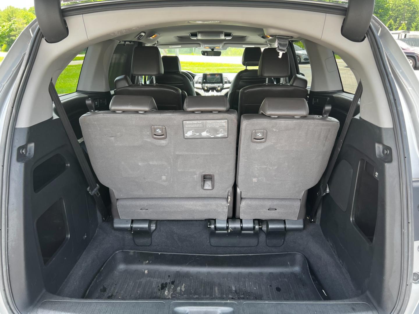 2018 Gray /Brown Honda Odyssey EXL DVD Nav (5FNRL6H7XJB) with an 3.5L V6 SOHC 24V engine, 9-Speed Automatic transmission, located at 11115 Chardon Rd. , Chardon, OH, 44024, (440) 214-9705, 41.580246, -81.241943 - Photo#40