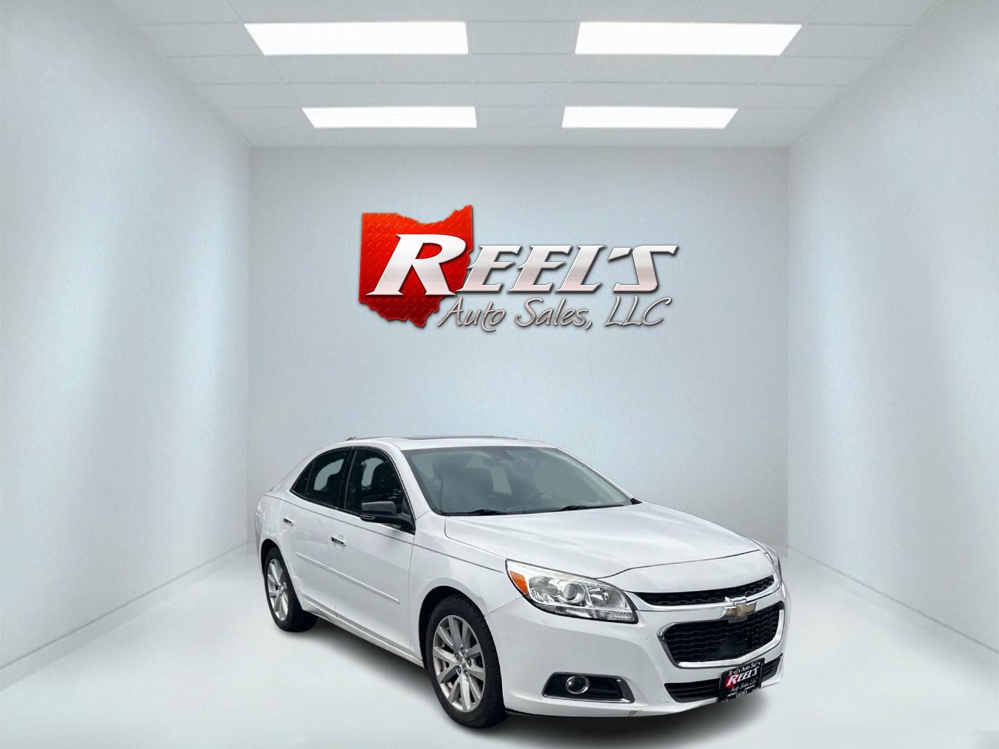 2014 White /Black Chevrolet Malibu 3LT (1G11G5SX7EF) with an 2.0L I4 DOHC 16V Turbo engine, 6-Speed Automatic transmission, located at 547 E. Main St., Orwell, OH, 44076, (440) 437-5893, 41.535435, -80.847855 - This 2014 Chevrolet Malibu 3LT is a well-equipped midsize sedan that offers a compelling blend of performance and comfort. Its 2.0-liter turbocharged inline-four engine, paired with a 6-speed automatic transmission, delivers impressive power with 259 horsepower and 295 lb-ft of torque. This powertra - Photo#2