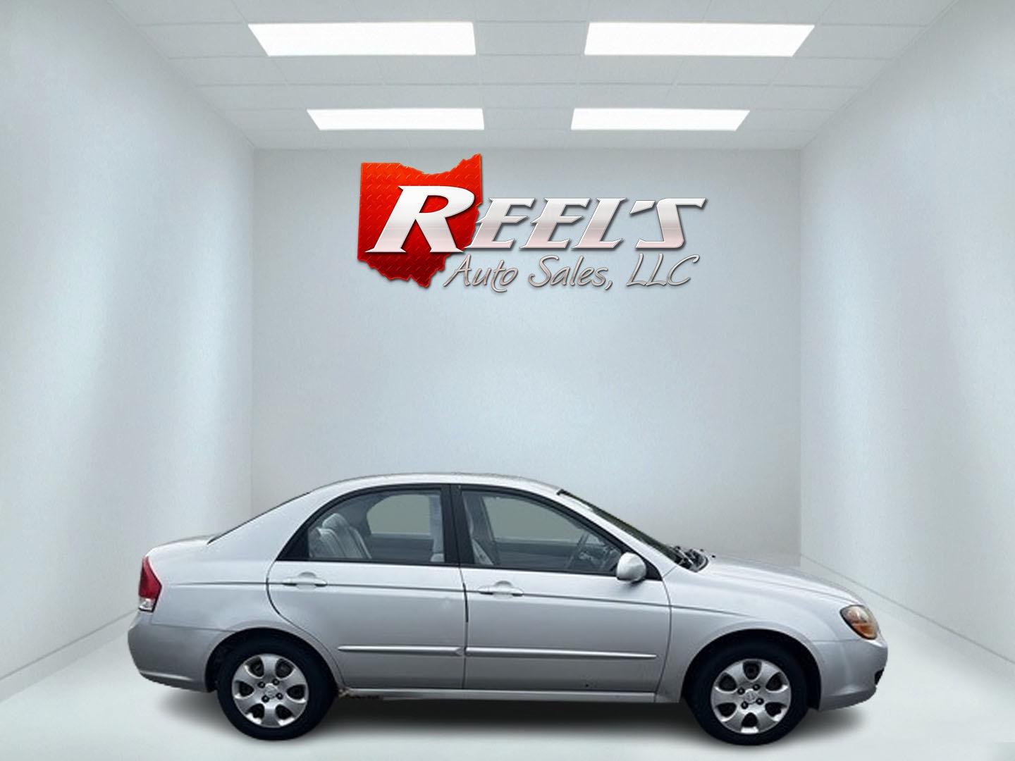 2009 Silver /Gray Kia Spectra EX (KNAFE222995) with an 2.0L I4 DOHC 16V engine, 4 Speed Auto transmission, located at 11115 Chardon Rd. , Chardon, OH, 44024, (440) 214-9705, 41.580246, -81.241943 - This 2009 Kia Spectra EX is a compact sedan that offers a balance of efficiency and practicality. It's equipped with a 2.0-liter inline-four engine paired with a 4-speed automatic transmission, providing a straightforward and reliable powertrain. The Spectra EX stands out for its fuel efficiency, ac - Photo#3