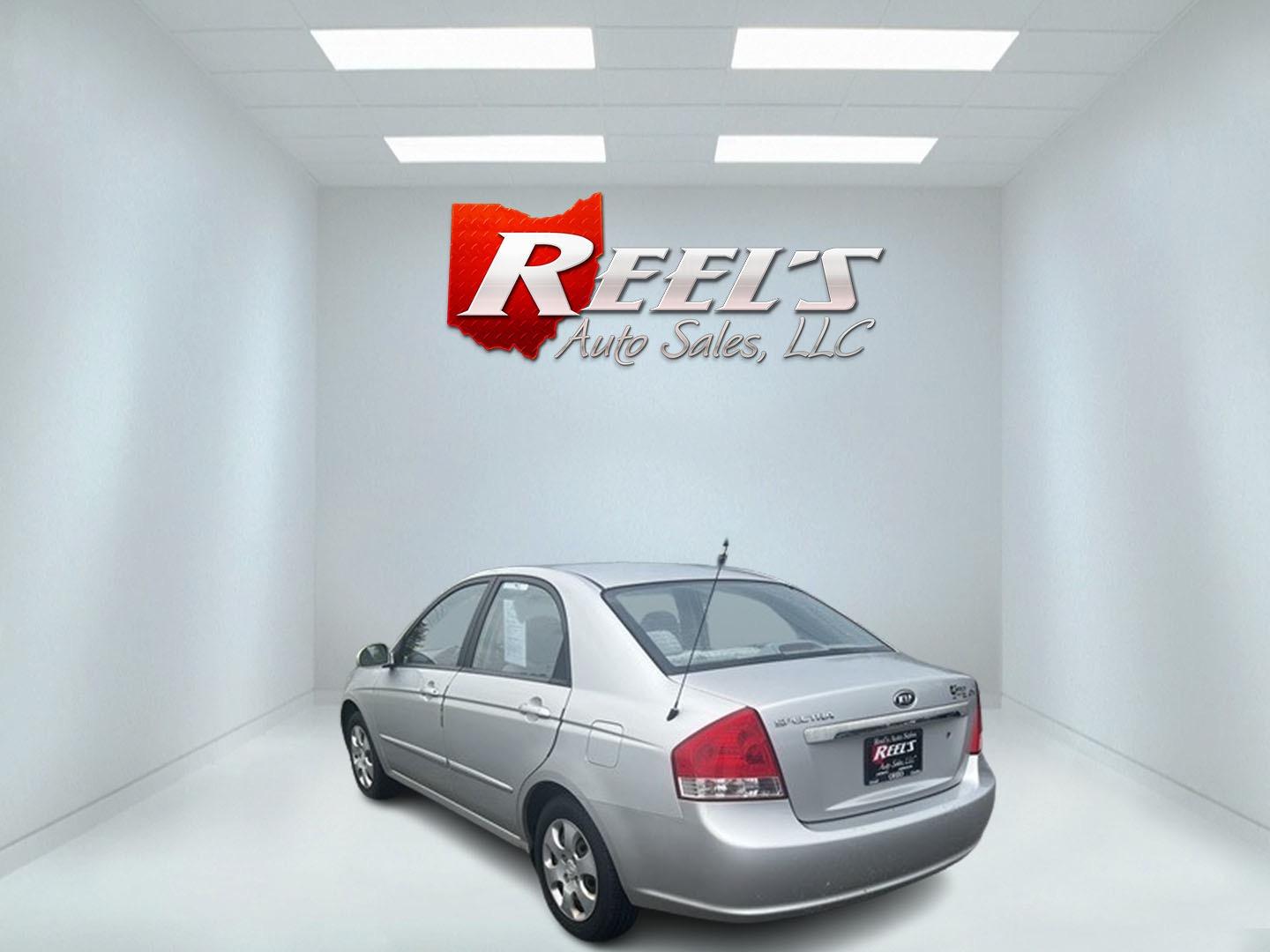 2009 Silver /Gray Kia Spectra EX (KNAFE222995) with an 2.0L I4 DOHC 16V engine, 4 Speed Auto transmission, located at 11115 Chardon Rd. , Chardon, OH, 44024, (440) 214-9705, 41.580246, -81.241943 - This 2009 Kia Spectra EX is a compact sedan that offers a balance of efficiency and practicality. It's equipped with a 2.0-liter inline-four engine paired with a 4-speed automatic transmission, providing a straightforward and reliable powertrain. The Spectra EX stands out for its fuel efficiency, ac - Photo#5