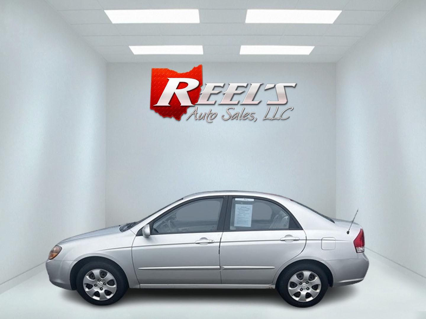 2009 Silver /Gray Kia Spectra EX (KNAFE222995) with an 2.0L I4 DOHC 16V engine, 4 Speed Auto transmission, located at 11115 Chardon Rd. , Chardon, OH, 44024, (440) 214-9705, 41.580246, -81.241943 - This 2009 Kia Spectra EX is a compact sedan that offers a balance of efficiency and practicality. It's equipped with a 2.0-liter inline-four engine paired with a 4-speed automatic transmission, providing a straightforward and reliable powertrain. The Spectra EX stands out for its fuel efficiency, ac - Photo#7