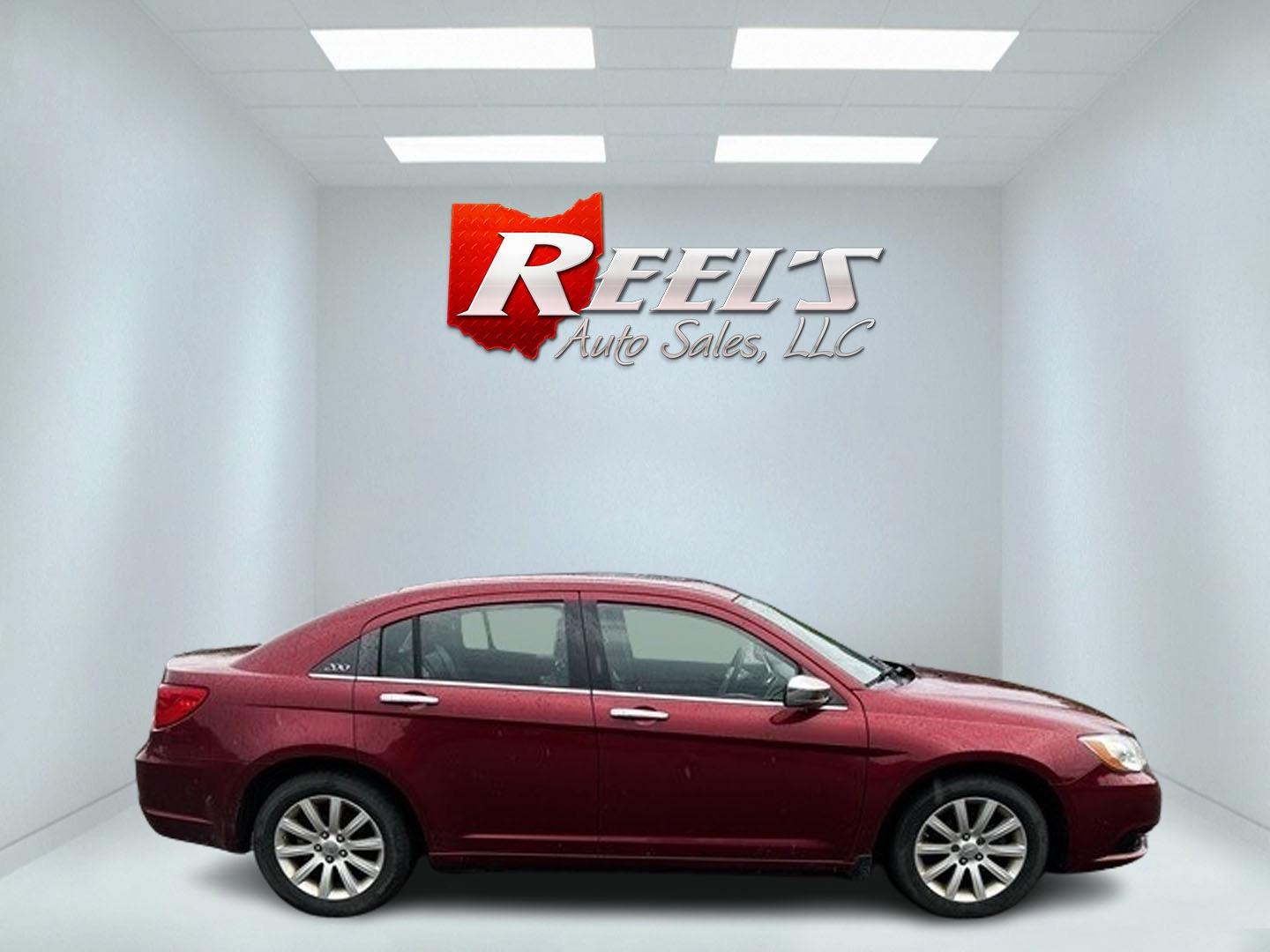 2014 Red /Black Chrysler 200 Limited (1C3CCBCG8EN) with an 3.6L V6 DOHC 24V FFV engine, 6-Speed Automatic transmission, located at 547 E. Main St., Orwell, OH, 44076, (440) 437-5893, 41.535435, -80.847855 - This 2014 Chrysler 200 Limited is a well-equipped mid-size sedan offering a blend of performance and luxury features. It's powered by a robust 3.6-liter Pentastar V6 engine, producing 283 horsepower, paired with a 6-speed automatic transmission. This combination delivers impressive acceleration, wi - Photo#4