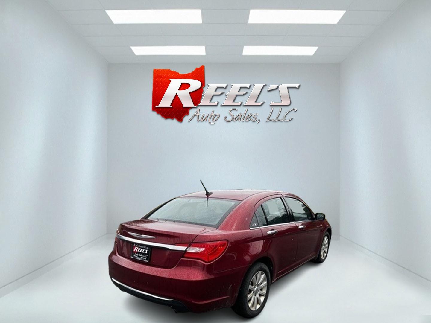 2014 Red /Black Chrysler 200 Limited (1C3CCBCG8EN) with an 3.6L V6 DOHC 24V FFV engine, 6-Speed Automatic transmission, located at 547 E. Main St., Orwell, OH, 44076, (440) 437-5893, 41.535435, -80.847855 - This 2014 Chrysler 200 Limited is a well-equipped mid-size sedan offering a blend of performance and luxury features. It's powered by a robust 3.6-liter Pentastar V6 engine, producing 283 horsepower, paired with a 6-speed automatic transmission. This combination delivers impressive acceleration, wi - Photo#5