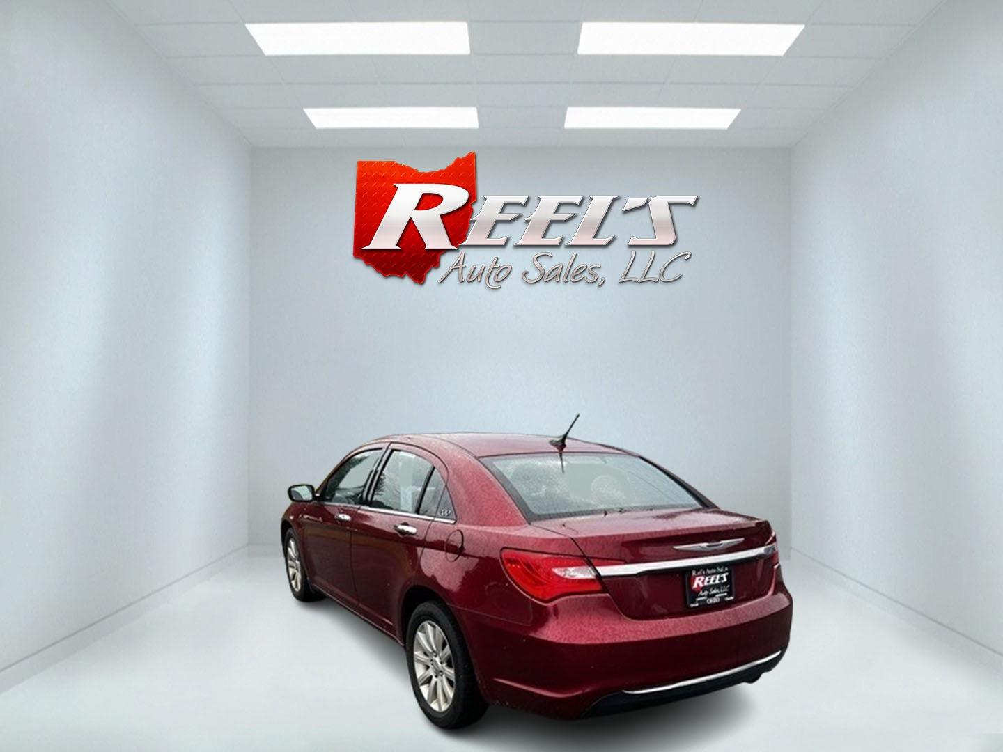 2014 Red /Black Chrysler 200 Limited (1C3CCBCG8EN) with an 3.6L V6 DOHC 24V FFV engine, 6-Speed Automatic transmission, located at 547 E. Main St., Orwell, OH, 44076, (440) 437-5893, 41.535435, -80.847855 - This 2014 Chrysler 200 Limited is a well-equipped mid-size sedan offering a blend of performance and luxury features. It's powered by a robust 3.6-liter Pentastar V6 engine, producing 283 horsepower, paired with a 6-speed automatic transmission. This combination delivers impressive acceleration, wi - Photo#7