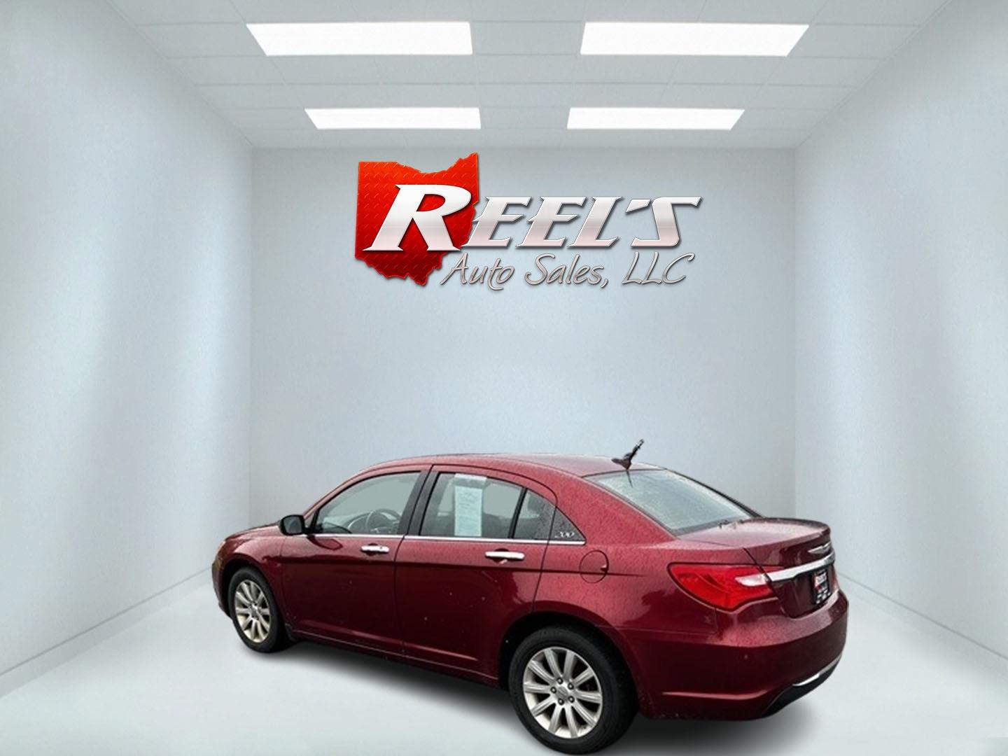 2014 Red /Black Chrysler 200 Limited (1C3CCBCG8EN) with an 3.6L V6 DOHC 24V FFV engine, 6-Speed Automatic transmission, located at 547 E. Main St., Orwell, OH, 44076, (440) 437-5893, 41.535435, -80.847855 - This 2014 Chrysler 200 Limited is a well-equipped mid-size sedan offering a blend of performance and luxury features. It's powered by a robust 3.6-liter Pentastar V6 engine, producing 283 horsepower, paired with a 6-speed automatic transmission. This combination delivers impressive acceleration, wi - Photo#8