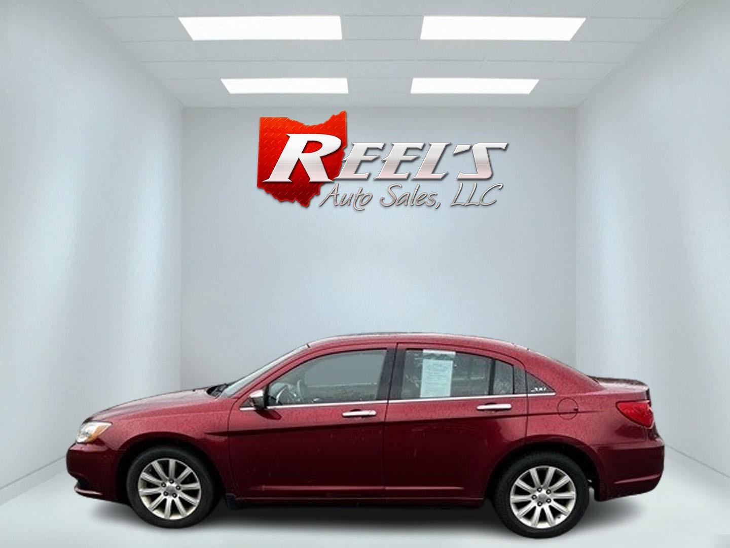 2014 Red /Black Chrysler 200 Limited (1C3CCBCG8EN) with an 3.6L V6 DOHC 24V FFV engine, 6-Speed Automatic transmission, located at 547 E. Main St., Orwell, OH, 44076, (440) 437-5893, 41.535435, -80.847855 - This 2014 Chrysler 200 Limited is a well-equipped mid-size sedan offering a blend of performance and luxury features. It's powered by a robust 3.6-liter Pentastar V6 engine, producing 283 horsepower, paired with a 6-speed automatic transmission. This combination delivers impressive acceleration, wi - Photo#9