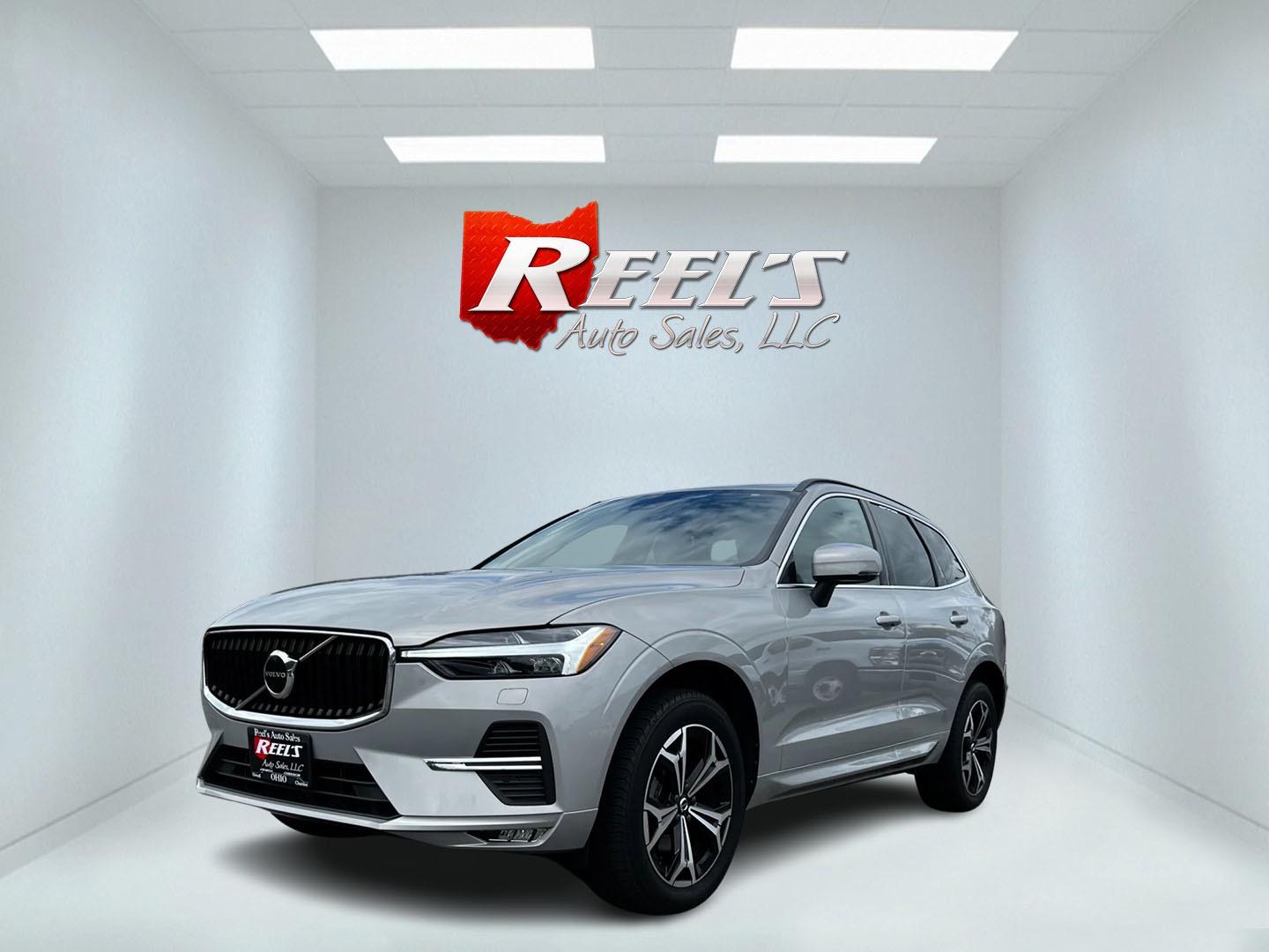 2022 Silver /Black Volvo XC60 Momentum (YV4L12RK2N1) with an 2.0 I4 DOHC I4 Turbo Mild Hybrid engine, 8-Speed Automatic transmission, located at 11115 Chardon Rd. , Chardon, OH, 44024, (440) 214-9705, 41.580246, -81.241943 - This 2022 Volvo XC60 B5 AWD Momentum is a well-equipped luxury SUV featuring a 2.0-liter turbocharged I4 engine producing 247 HP, complemented by a 48V mild hybrid system adding 13 HP. It boasts advanced safety features like blind spot monitoring, rear cross traffic alert, lane keep assist, and auto - Photo#0