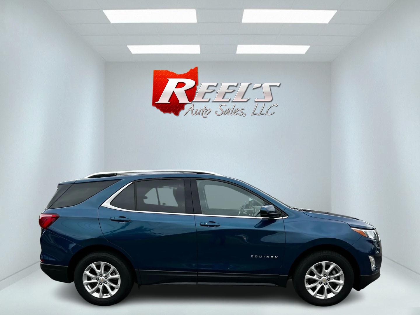 2020 Blue /Black Chevrolet Equinox LT AWD (2GNAXUEV9L6) with an 1.5L I4 DOHC 16V TURBO engine, 6-Speed Automatic transmission, located at 11115 Chardon Rd. , Chardon, OH, 44024, (440) 214-9705, 41.580246, -81.241943 - This 2020 Chevrolet Equinox LT AWD is a well-equipped compact SUV featuring a 1.5-liter turbocharged Ecotec engine paired with a 6-speed automatic transmission. It offers impressive fuel economy with 25 MPG city and 30 MPG highway. The vehicle comes with a range of safety features including blind sp - Photo#4