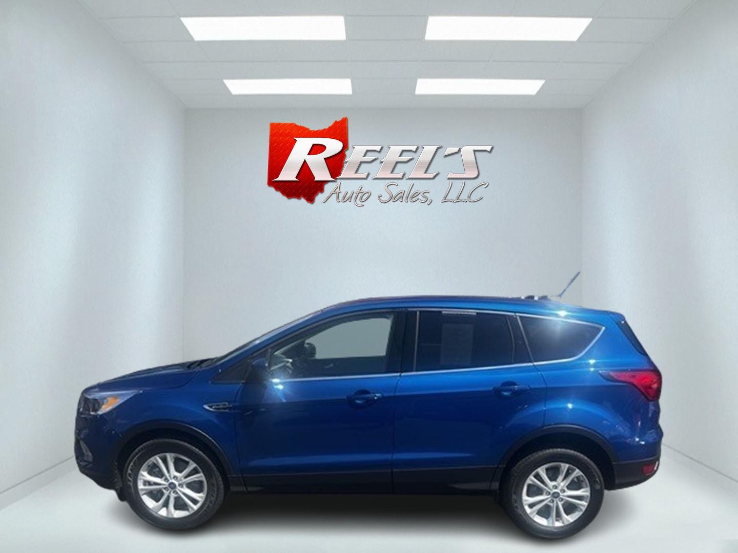 2019 Blue /Black Ford Escape SE 4WD (1FMCU9GD6KU) with an 1.5L I4 DOHC 16V TURBO engine, 6 Speed Auto transmission, located at 547 E. Main St., Orwell, OH, 44076, (440) 437-5893, 41.535435, -80.847855 - This 2019 Ford Escape SE 4WD is a well-equipped one owner compact SUV that offers a balance of efficiency and features. It's powered by a 1.5L EcoBoost 4-cylinder engine paired with a 6-speed automatic transmission, providing capable performance with good fuel economy (22 mpg city, 28 mpg highway). - Photo#9