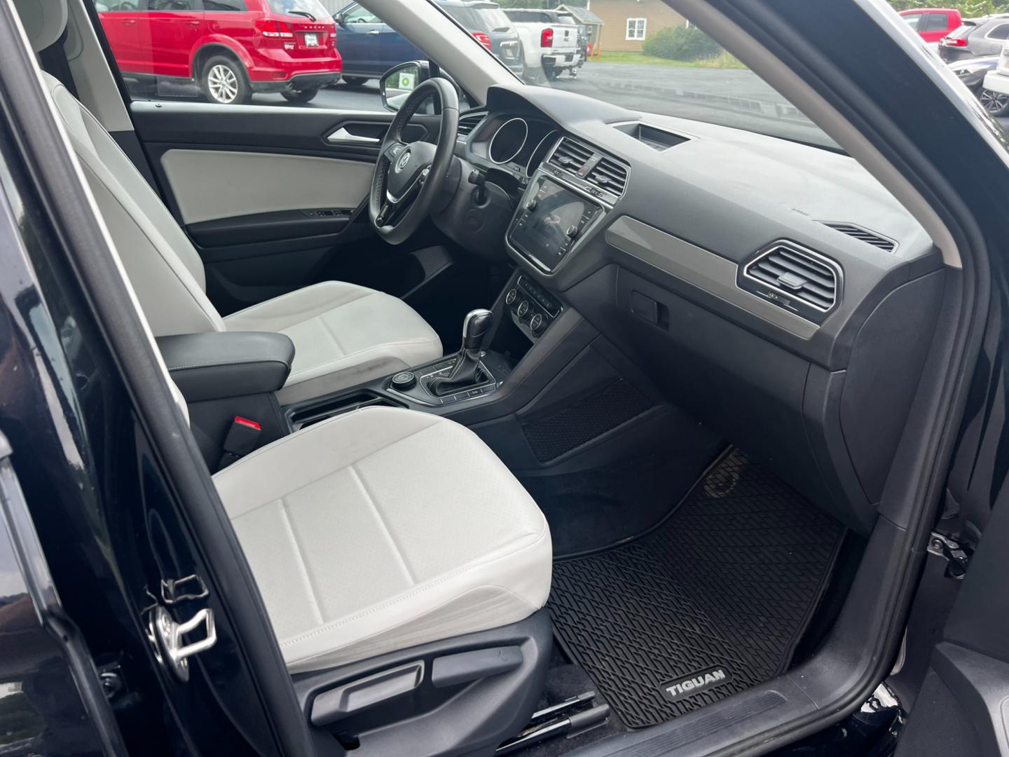 2021 Black /White Volkswagen Tiguan SE 4Motion AWD (3VV2B7AX6MM) with an 2.0L I4 DOHC 16V TURBO engine, 8A transmission, located at 11115 Chardon Rd. , Chardon, OH, 44024, (440) 214-9705, 41.580246, -81.241943 - This 2021 Volkswagen Tiguan SE 4Motion is a well-equipped compact SUV that combines performance, comfort, and advanced technology. It features a 2.0-liter turbocharged four-cylinder engine paired with an 8-speed automatic transmission and all-wheel drive system. This vehicle offers a luxurious inter - Photo#40