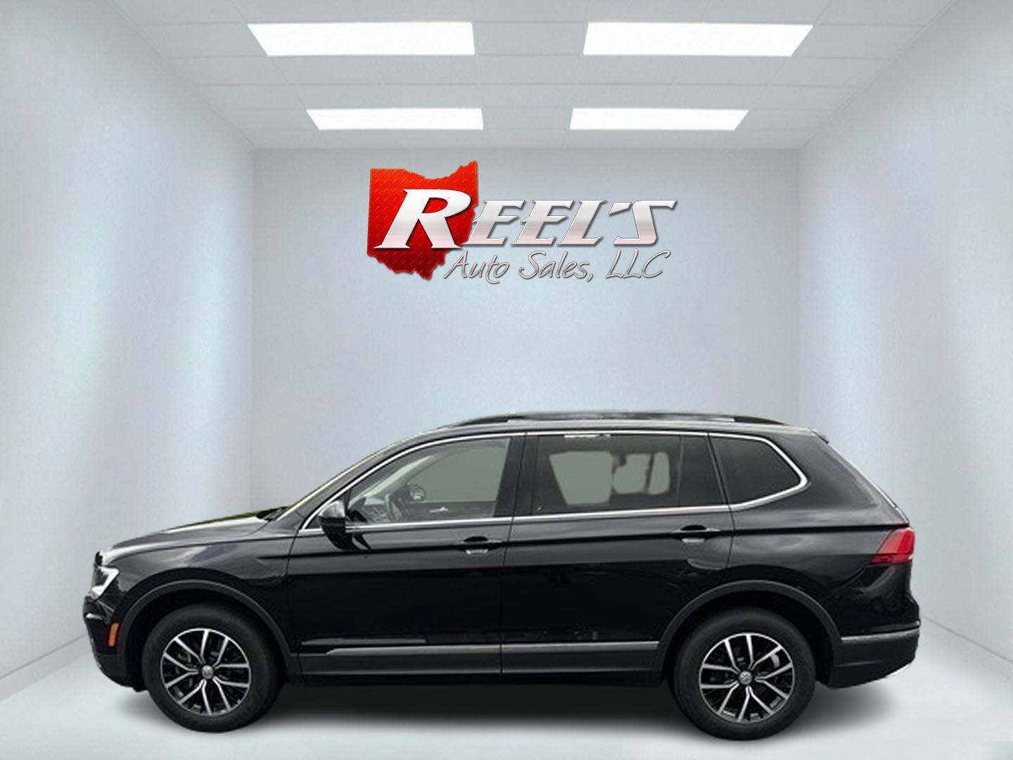 2021 Black /White Volkswagen Tiguan SE 4Motion AWD (3VV2B7AX6MM) with an 2.0L I4 DOHC 16V TURBO engine, 8A transmission, located at 11115 Chardon Rd. , Chardon, OH, 44024, (440) 214-9705, 41.580246, -81.241943 - This 2021 Volkswagen Tiguan SE 4Motion is a well-equipped compact SUV that combines performance, comfort, and advanced technology. It features a 2.0-liter turbocharged four-cylinder engine paired with an 8-speed automatic transmission and all-wheel drive system. This vehicle offers a luxurious inter - Photo#9