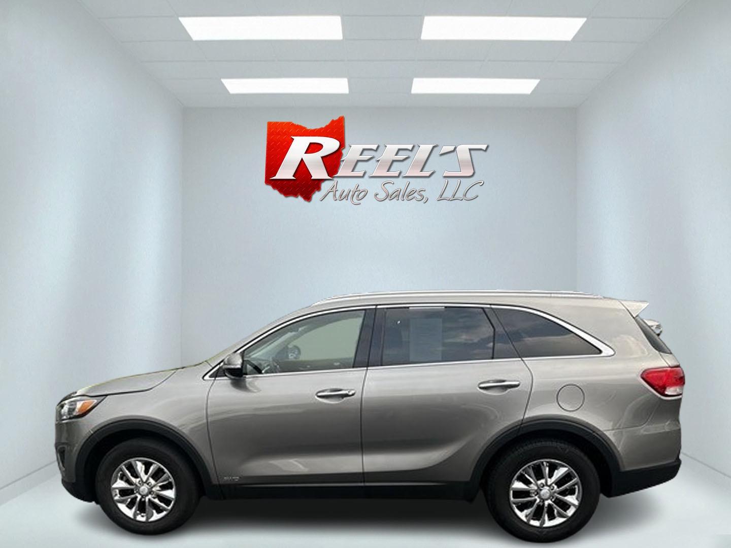 2016 Gray /Black Kia Sorento LX AWD (5XYPGDA39GG) with an 2.4L I4 DOHC 16V engine, 6-Speed Automatic transmission, located at 547 E. Main St., Orwell, OH, 44076, (440) 437-5893, 41.535435, -80.847855 - This 2016 Kia Sorento LX AWD is a practical and capable midsize SUV that offers a balance of comfort and utility. It's powered by a 2.4-liter GDI four-cylinder engine paired with a 6-speed automatic transmission and all-wheel drive system. This vehicle features a lockable center differential and sel - Photo#9