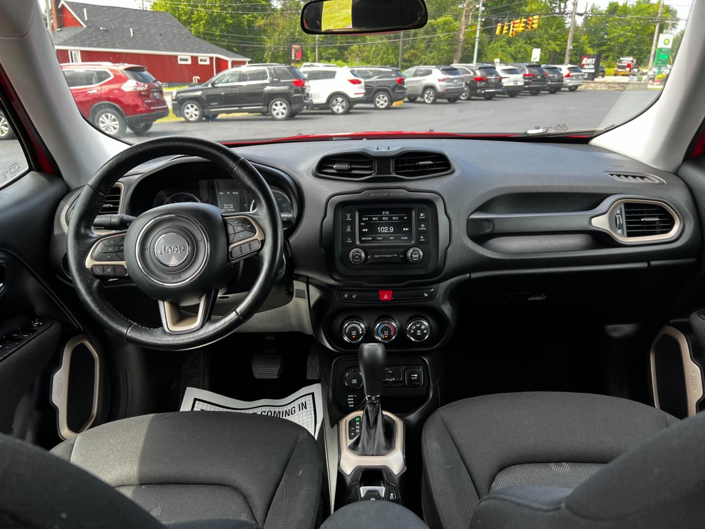 2017 Red /Black Jeep Renegade Latitude 4WD (ZACCJBBB8HP) with an 2.4L I4 DOHC 16V engine, 9-Speed Automatic transmission, located at 547 E. Main St., Orwell, OH, 44076, (440) 437-5893, 41.535435, -80.847855 - This 2017 Jeep Renegade Latitude 4WD is a compact SUV that combines Jeep's off-road heritage with modern amenities. It's equipped with a 2.4-liter Multiair four-cylinder engine mated to a 9-speed automatic transmission, offering four-wheel drive capability. This vehicle features a blend of convenien - Photo#30