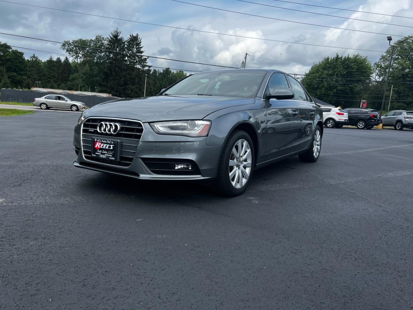 2013 Gray /Black Audi A4 2.0T Premium Sedan quattro (WAUBFAFL0DN) with an 2.0L I4 DOHC 16V TURBO engine, 8-Speed Automatic transmission, located at 11115 Chardon Rd. , Chardon, OH, 44024, (440) 214-9705, 41.580246, -81.241943 - Photo#0