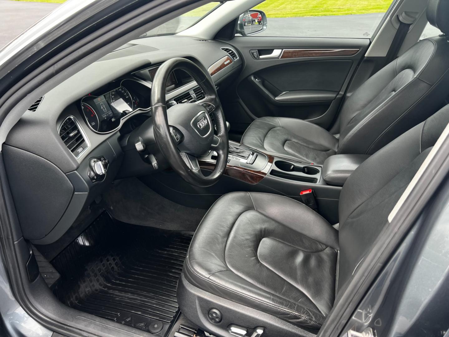 2013 Gray /Black Audi A4 2.0T Premium Sedan quattro (WAUBFAFL0DN) with an 2.0L I4 DOHC 16V TURBO engine, 8-Speed Automatic transmission, located at 11115 Chardon Rd. , Chardon, OH, 44024, (440) 214-9705, 41.580246, -81.241943 - This 2013 Audi A4 Premium Quattro is a refined luxury sedan that combines performance, comfort, and efficiency. It features a 2.0-liter turbocharged four-cylinder engine paired with an 8-speed automatic transmission and Audi's renowned Quattro all-wheel drive system. The A4 offers a blend of luxury - Photo#15