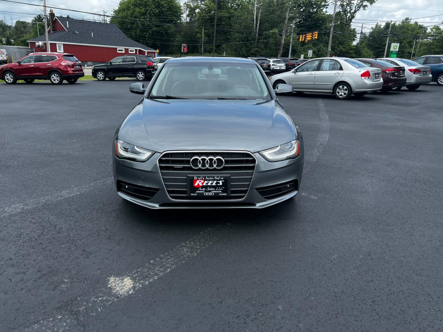 2013 Gray /Black Audi A4 2.0T Premium Sedan quattro (WAUBFAFL0DN) with an 2.0L I4 DOHC 16V TURBO engine, 8-Speed Automatic transmission, located at 11115 Chardon Rd. , Chardon, OH, 44024, (440) 214-9705, 41.580246, -81.241943 - Photo#1