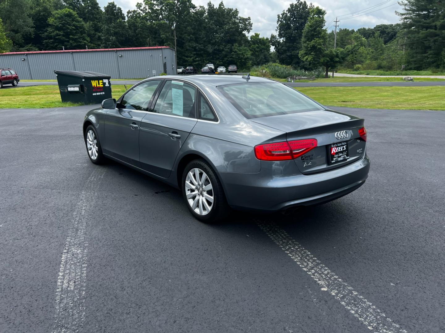 2013 Gray /Black Audi A4 2.0T Premium Sedan quattro (WAUBFAFL0DN) with an 2.0L I4 DOHC 16V TURBO engine, 8-Speed Automatic transmission, located at 11115 Chardon Rd. , Chardon, OH, 44024, (440) 214-9705, 41.580246, -81.241943 - This 2013 Audi A4 Premium Quattro is a refined luxury sedan that combines performance, comfort, and efficiency. It features a 2.0-liter turbocharged four-cylinder engine paired with an 8-speed automatic transmission and Audi's renowned Quattro all-wheel drive system. The A4 offers a blend of luxury - Photo#9