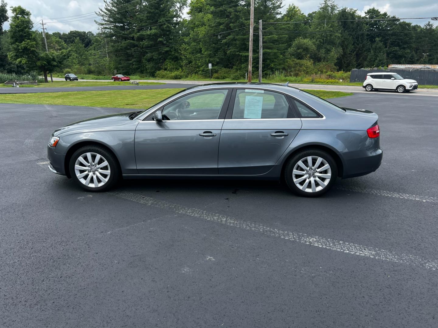 2013 Gray /Black Audi A4 2.0T Premium Sedan quattro (WAUBFAFL0DN) with an 2.0L I4 DOHC 16V TURBO engine, 8-Speed Automatic transmission, located at 11115 Chardon Rd. , Chardon, OH, 44024, (440) 214-9705, 41.580246, -81.241943 - Photo#12