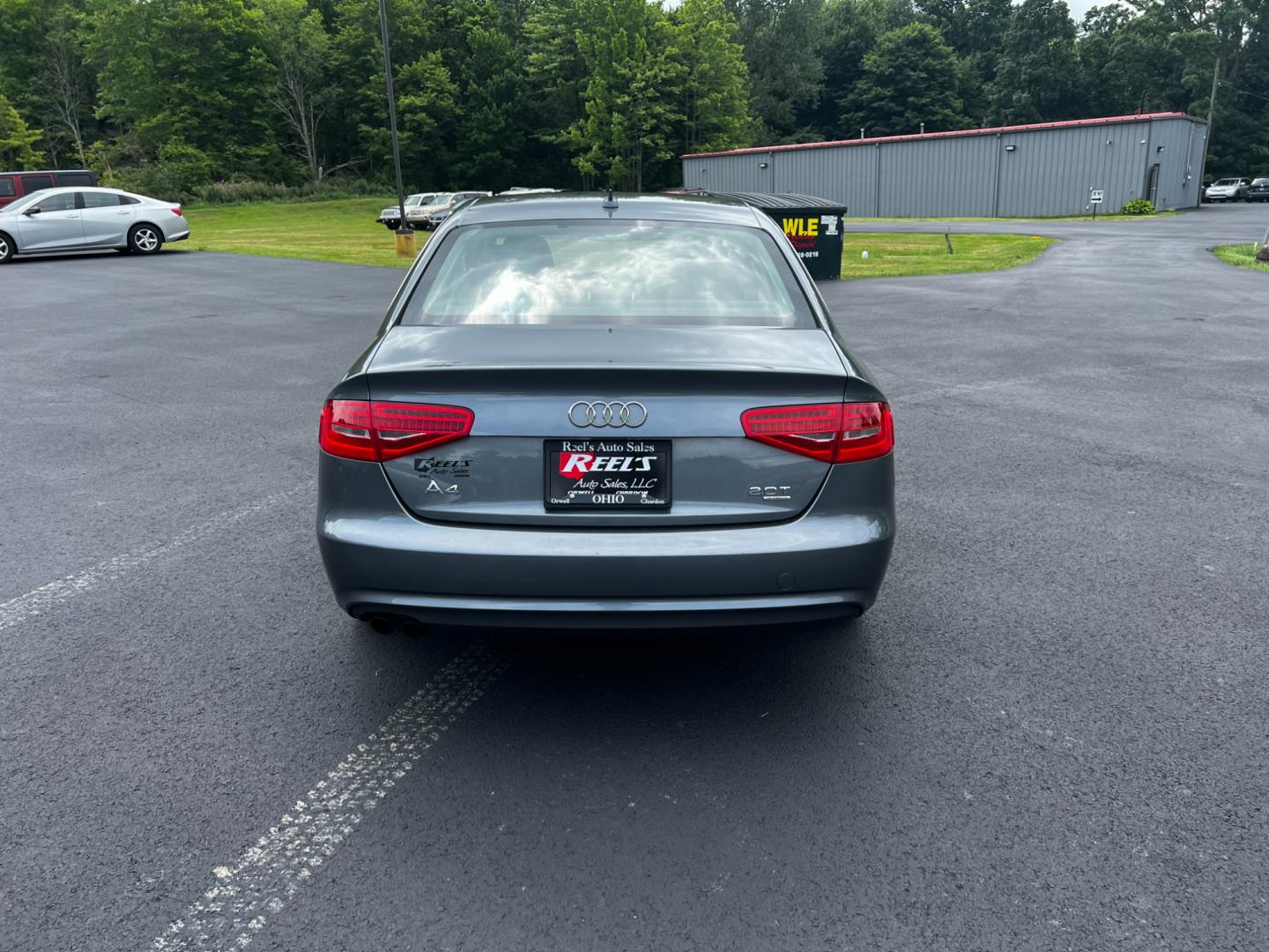 2013 Gray /Black Audi A4 2.0T Premium Sedan quattro (WAUBFAFL0DN) with an 2.0L I4 DOHC 16V TURBO engine, 8-Speed Automatic transmission, located at 11115 Chardon Rd. , Chardon, OH, 44024, (440) 214-9705, 41.580246, -81.241943 - This 2013 Audi A4 Premium Quattro is a refined luxury sedan that combines performance, comfort, and efficiency. It features a 2.0-liter turbocharged four-cylinder engine paired with an 8-speed automatic transmission and Audi's renowned Quattro all-wheel drive system. The A4 offers a blend of luxury - Photo#8