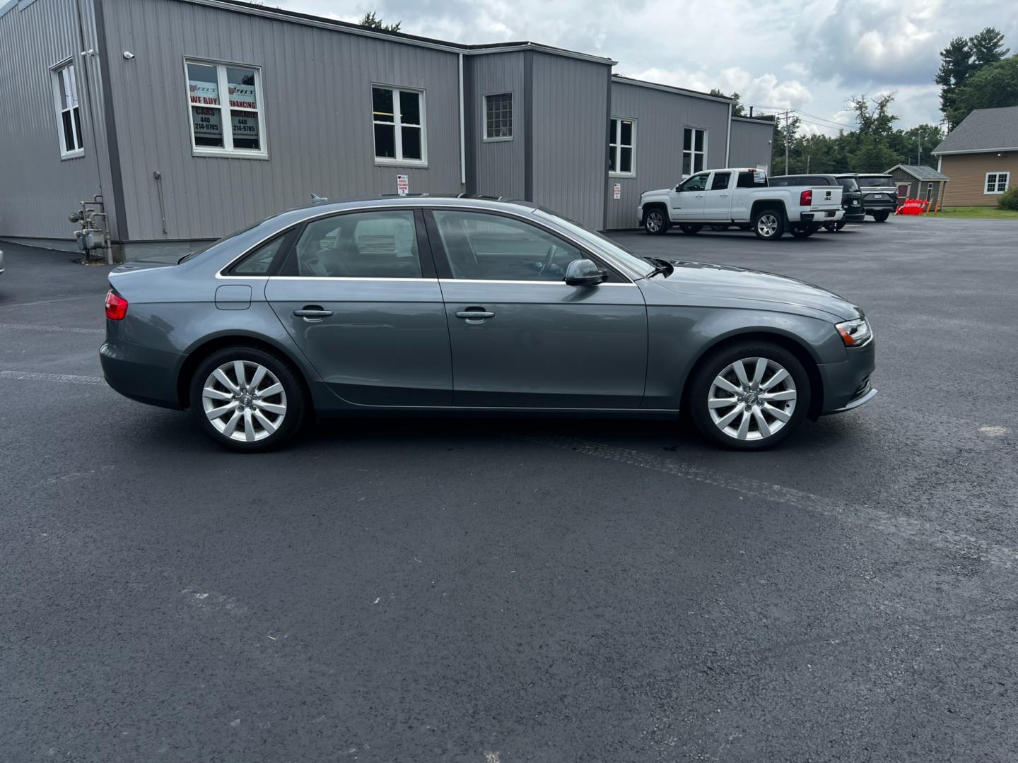 2013 Gray /Black Audi A4 2.0T Premium Sedan quattro (WAUBFAFL0DN) with an 2.0L I4 DOHC 16V TURBO engine, 8-Speed Automatic transmission, located at 11115 Chardon Rd. , Chardon, OH, 44024, (440) 214-9705, 41.580246, -81.241943 - Photo#5