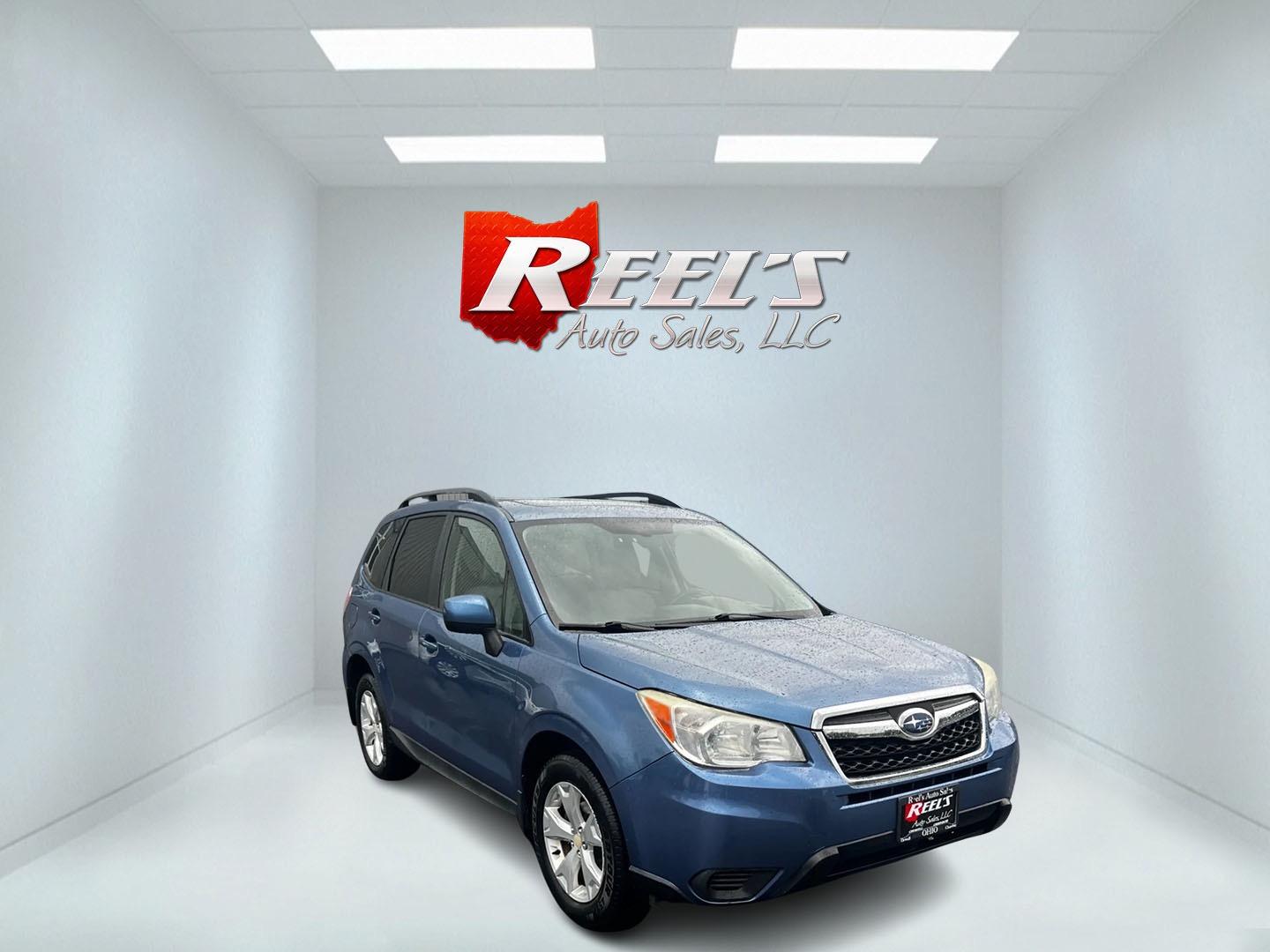 2015 Blue /Gray Subaru Forester 2.5i Premium (JF2SJADC1FH) with an 2.5L H4 SOHC 16V engine, Automatic transmission, located at 11115 Chardon Rd. , Chardon, OH, 44024, (440) 214-9705, 41.580246, -81.241943 - Photo#2