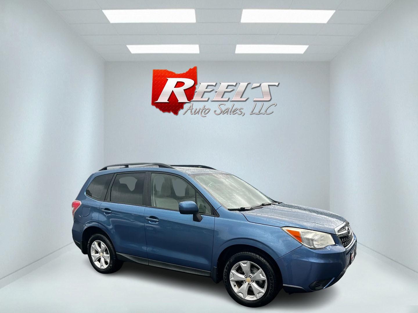 2015 Blue /Gray Subaru Forester 2.5i Premium (JF2SJADC1FH) with an 2.5L H4 SOHC 16V engine, Automatic transmission, located at 11115 Chardon Rd. , Chardon, OH, 44024, (440) 214-9705, 41.580246, -81.241943 - Photo#3