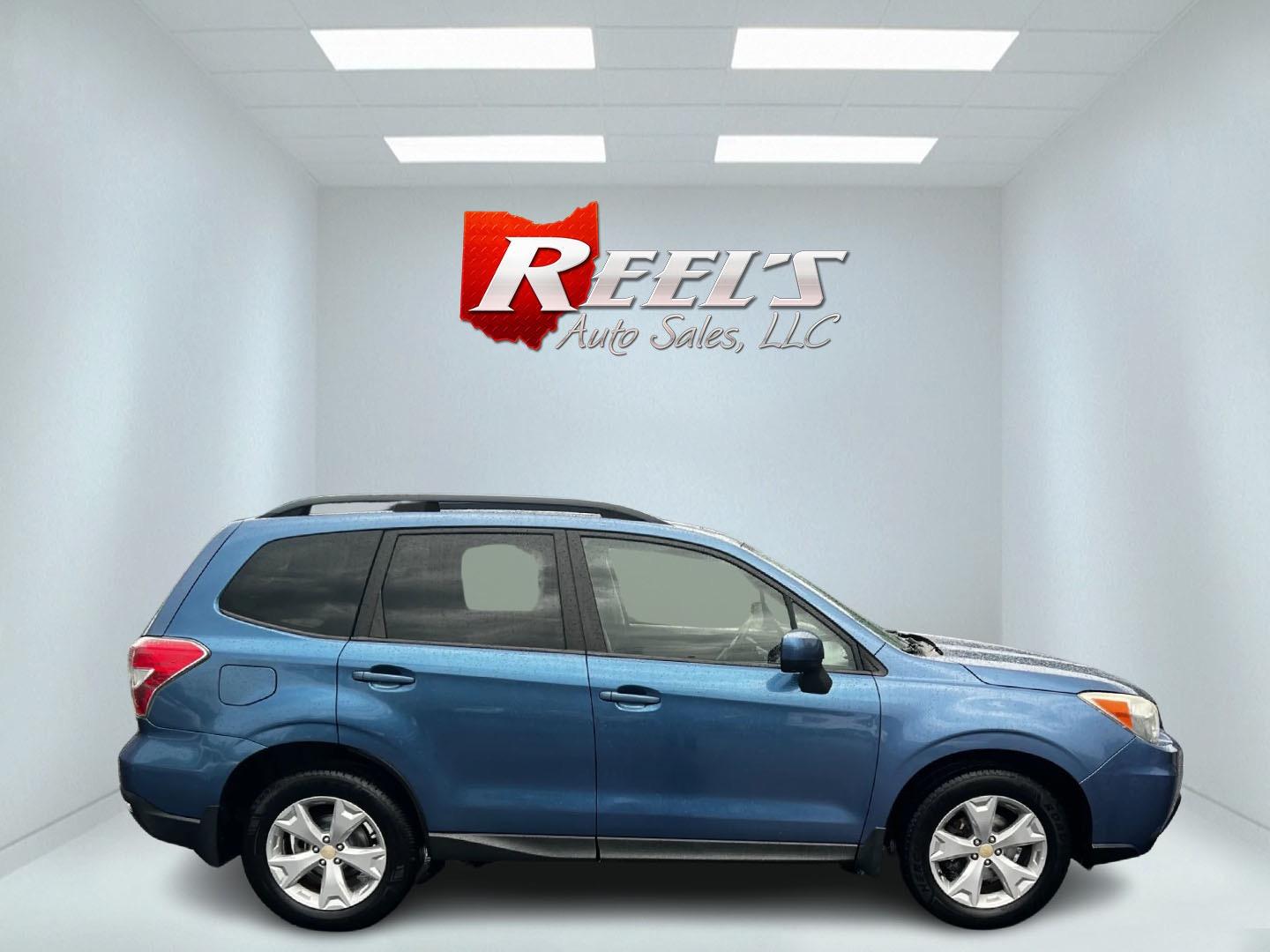 2015 Blue /Gray Subaru Forester 2.5i Premium (JF2SJADC1FH) with an 2.5L H4 SOHC 16V engine, Automatic transmission, located at 11115 Chardon Rd. , Chardon, OH, 44024, (440) 214-9705, 41.580246, -81.241943 - This One Owner 2015 Subaru Forester 2.5i Premium is a well-equipped compact SUV that combines practicality, comfort, and efficiency. It features a 2.5-liter horizontally-opposed four-cylinder engine paired with a Continuously Variable Transmission (CVT), offering smooth power delivery and good fuel - Photo#4