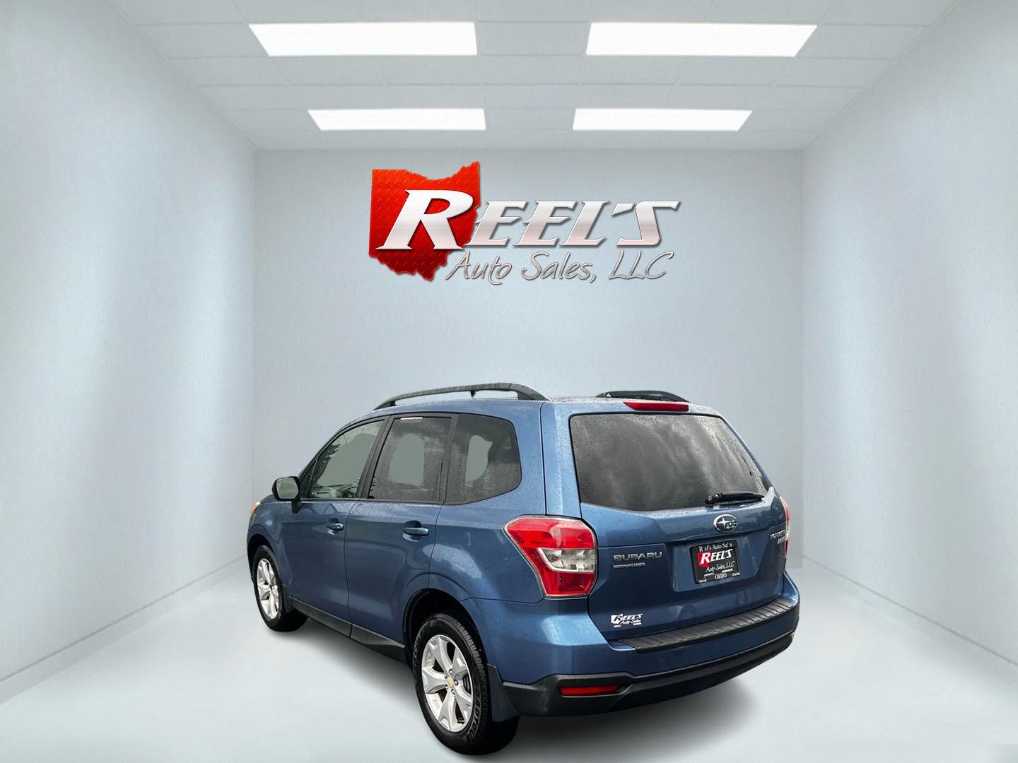 2015 Blue /Gray Subaru Forester 2.5i Premium (JF2SJADC1FH) with an 2.5L H4 SOHC 16V engine, Automatic transmission, located at 11115 Chardon Rd. , Chardon, OH, 44024, (440) 214-9705, 41.580246, -81.241943 - Photo#7