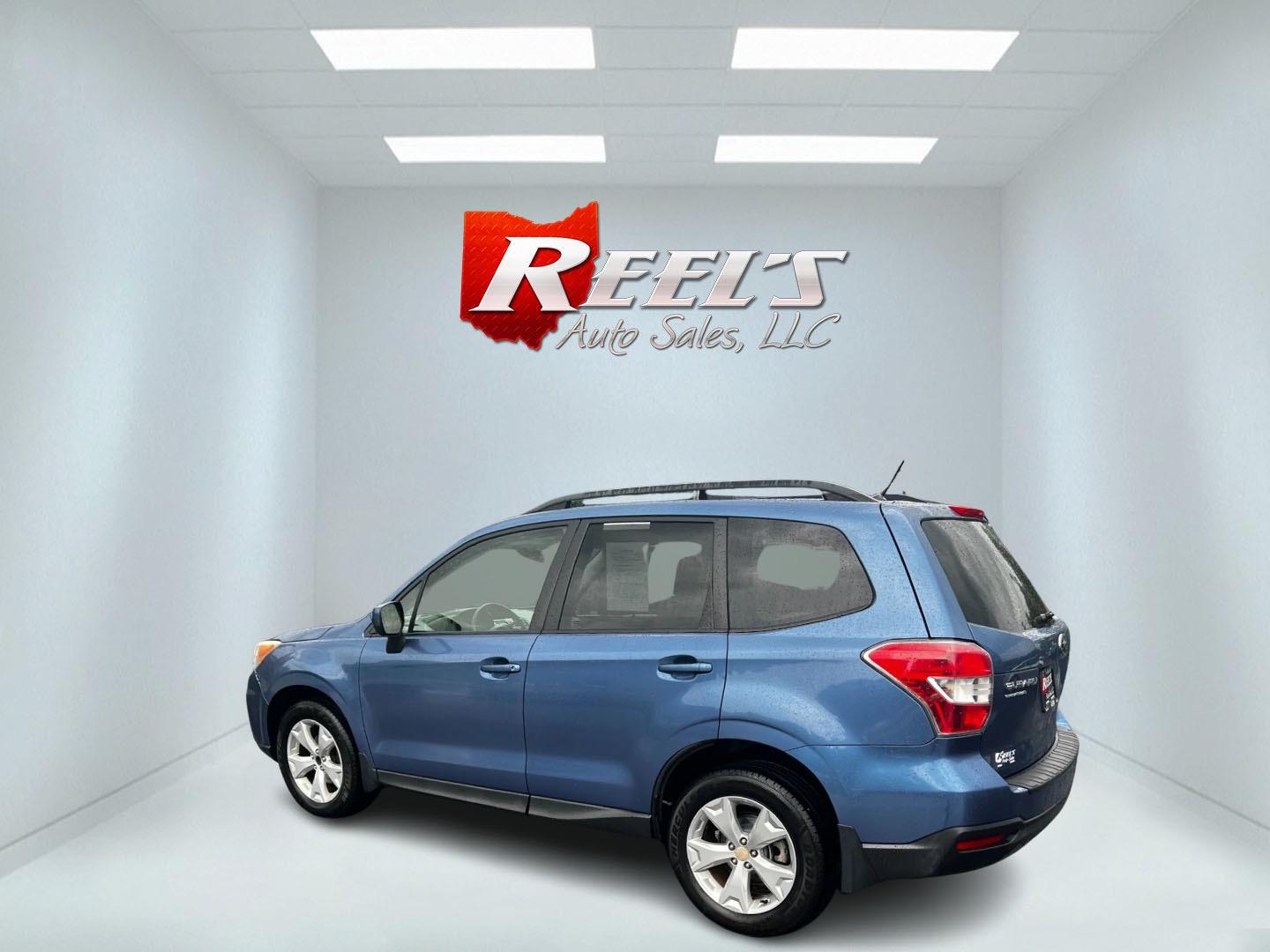 2015 Blue /Gray Subaru Forester 2.5i Premium (JF2SJADC1FH) with an 2.5L H4 SOHC 16V engine, Automatic transmission, located at 11115 Chardon Rd. , Chardon, OH, 44024, (440) 214-9705, 41.580246, -81.241943 - This One Owner 2015 Subaru Forester 2.5i Premium is a well-equipped compact SUV that combines practicality, comfort, and efficiency. It features a 2.5-liter horizontally-opposed four-cylinder engine paired with a Continuously Variable Transmission (CVT), offering smooth power delivery and good fuel - Photo#8