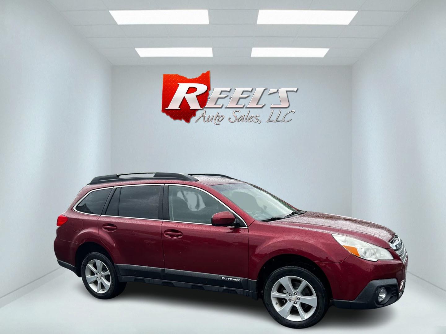 2014 Red /Black Subaru Outback 2.5I Premium (4S4BRBCC0E3) with an 2.5L H4 DOHC 16V engine, Automatic transmission, located at 11115 Chardon Rd. , Chardon, OH, 44024, (440) 214-9705, 41.580246, -81.241943 - This 2014 Subaru Outback 2.5i Premium is a versatile and capable crossover wagon that combines practicality with comfort. It's powered by a 2.5-liter horizontally-opposed four-cylinder engine, paired with a Continuously Variable Transmission (CVT) featuring paddle shifters for a more engaging drivin - Photo#3