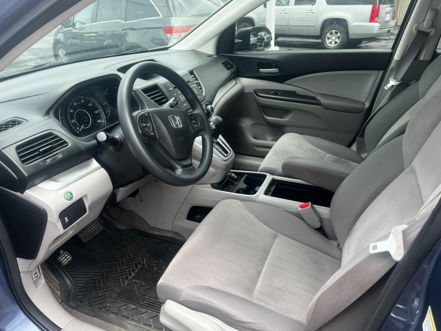 2013 Blue /Gray Honda CR-V LX 4WD 5-Speed AT (2HKRM4H35DH) with an 2.4L I4 DOHC 16V engine, 5-Speed Automatic transmission, located at 547 E. Main St., Orwell, OH, 44076, (440) 437-5893, 41.535435, -80.847855 - This 2013 Honda CR-V LX 4WD is a reliable and practical compact SUV that offers a good balance of efficiency and capability. It's powered by a 2.4-liter inline-four engine paired with a 5-speed automatic transmission, providing adequate performance for daily driving and light off-road use. The 4WD s - Photo#14