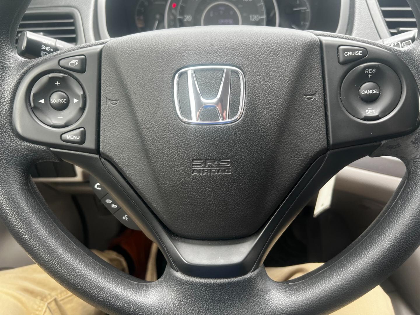 2013 Blue /Gray Honda CR-V LX 4WD 5-Speed AT (2HKRM4H35DH) with an 2.4L I4 DOHC 16V engine, 5-Speed Automatic transmission, located at 547 E. Main St., Orwell, OH, 44076, (440) 437-5893, 41.535435, -80.847855 - This 2013 Honda CR-V LX 4WD is a reliable and practical compact SUV that offers a good balance of efficiency and capability. It's powered by a 2.4-liter inline-four engine paired with a 5-speed automatic transmission, providing adequate performance for daily driving and light off-road use. The 4WD s - Photo#20