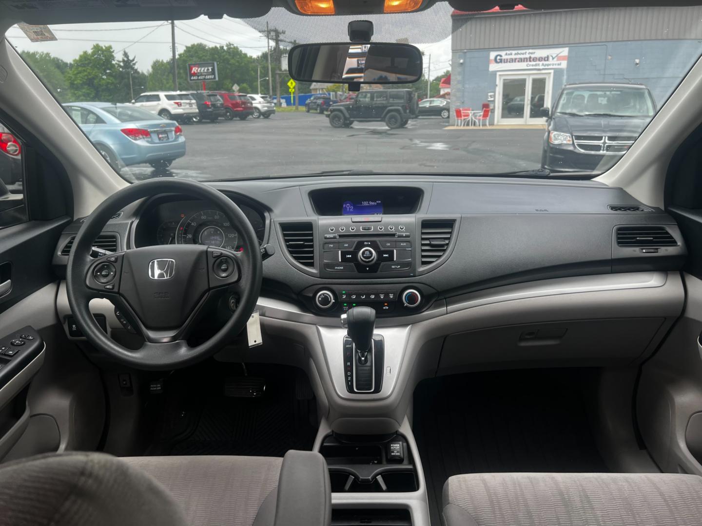 2013 Blue /Gray Honda CR-V LX 4WD 5-Speed AT (2HKRM4H35DH) with an 2.4L I4 DOHC 16V engine, 5-Speed Automatic transmission, located at 547 E. Main St., Orwell, OH, 44076, (440) 437-5893, 41.535435, -80.847855 - This 2013 Honda CR-V LX 4WD is a reliable and practical compact SUV that offers a good balance of efficiency and capability. It's powered by a 2.4-liter inline-four engine paired with a 5-speed automatic transmission, providing adequate performance for daily driving and light off-road use. The 4WD s - Photo#30