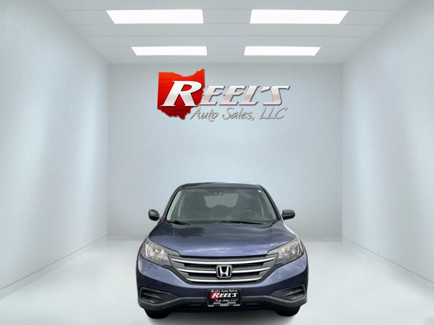 2013 Blue /Gray Honda CR-V LX 4WD 5-Speed AT (2HKRM4H35DH) with an 2.4L I4 DOHC 16V engine, 5-Speed Automatic transmission, located at 547 E. Main St., Orwell, OH, 44076, (440) 437-5893, 41.535435, -80.847855 - This 2013 Honda CR-V LX 4WD is a reliable and practical compact SUV that offers a good balance of efficiency and capability. It's powered by a 2.4-liter inline-four engine paired with a 5-speed automatic transmission, providing adequate performance for daily driving and light off-road use. The 4WD s - Photo#1