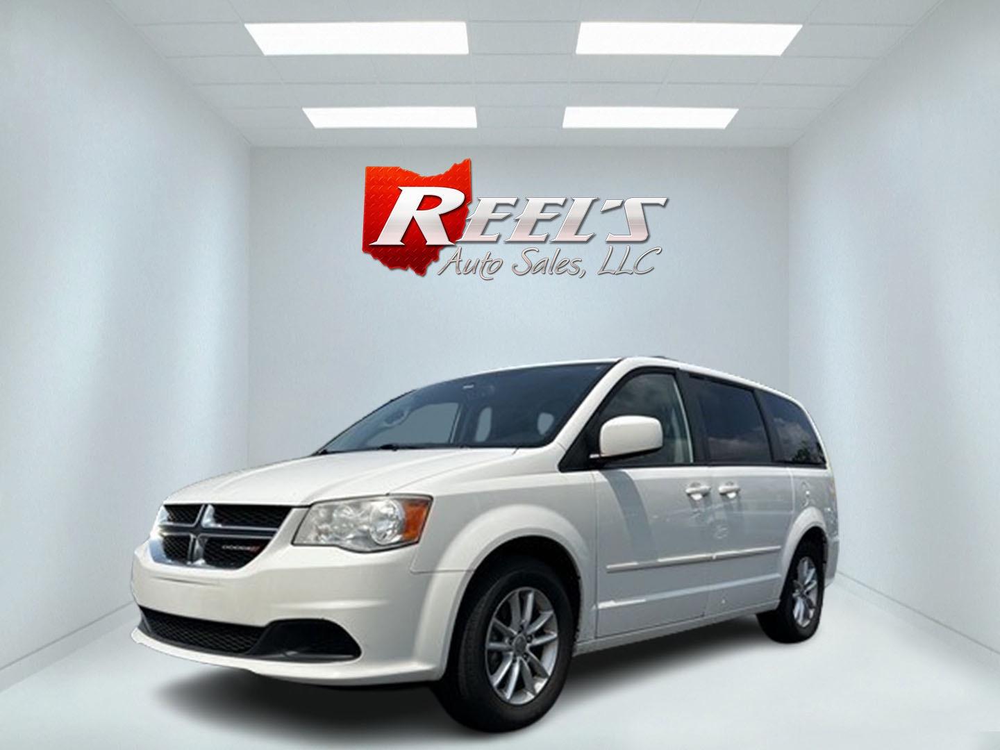 2013 White /Black Dodge Grand Caravan SXT (2C4RDGCG0DR) with an 3.6L V6 DOHC 24V FFV engine, 6-Speed Automatic transmission, located at 547 E. Main St., Orwell, OH, 44076, (440) 437-5893, 41.535435, -80.847855 - Photo#0