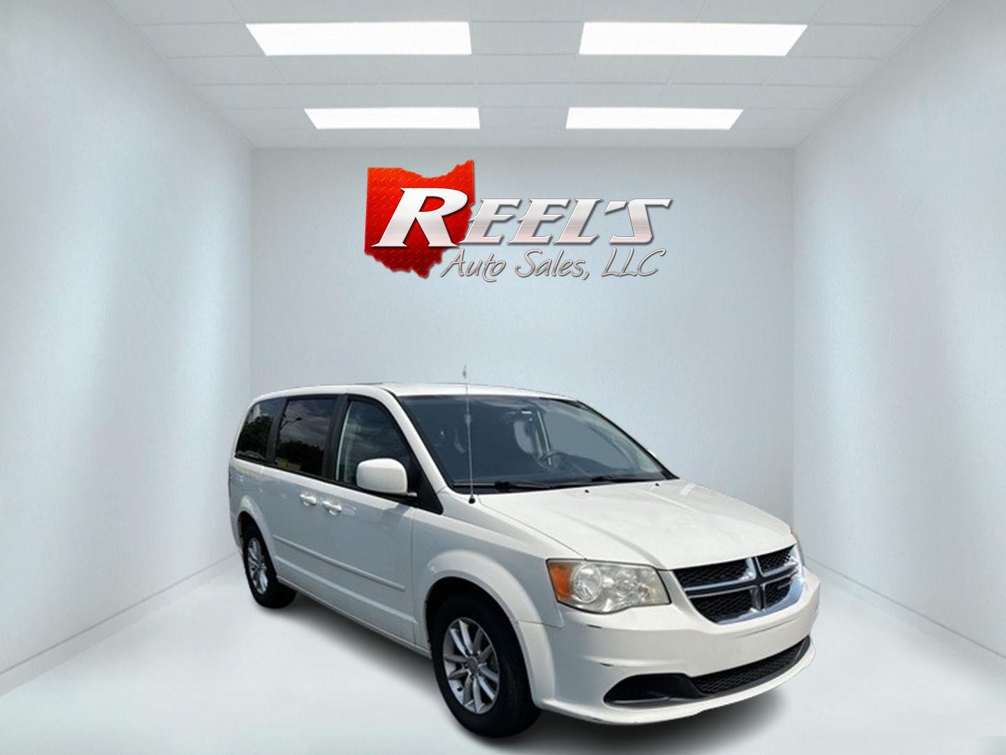 2013 White /Black Dodge Grand Caravan SXT (2C4RDGCG0DR) with an 3.6L V6 DOHC 24V FFV engine, 6-Speed Automatic transmission, located at 547 E. Main St., Orwell, OH, 44076, (440) 437-5893, 41.535435, -80.847855 - Photo#2