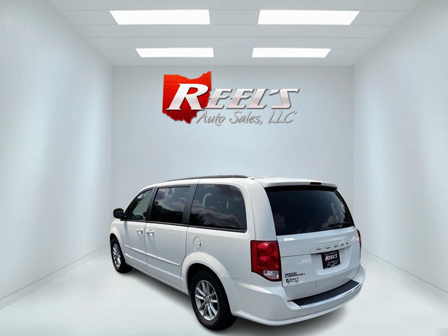 2013 White /Black Dodge Grand Caravan SXT (2C4RDGCG0DR) with an 3.6L V6 DOHC 24V FFV engine, 6-Speed Automatic transmission, located at 547 E. Main St., Orwell, OH, 44076, (440) 437-5893, 41.535435, -80.847855 - Photo#6