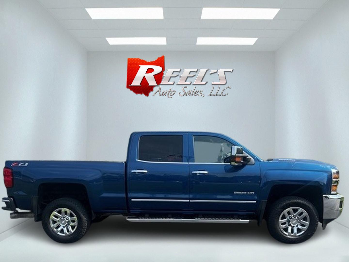 2019 Blue /Black Chevrolet Silverado 2500HD LTZ Crew Cab 4WD (1GC1KTEY3KF) with an 6.6L V8 OHV 16V DIESEL engine, 6A transmission, located at 11115 Chardon Rd. , Chardon, OH, 44024, (440) 214-9705, 41.580246, -81.241943 - Photo#4