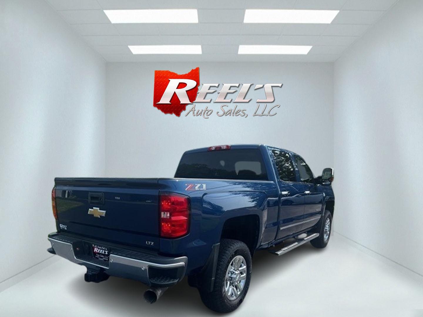 2019 Blue /Black Chevrolet Silverado 2500HD LTZ Crew Cab 4WD (1GC1KTEY3KF) with an 6.6L V8 OHV 16V DIESEL engine, 6A transmission, located at 11115 Chardon Rd. , Chardon, OH, 44024, (440) 214-9705, 41.580246, -81.241943 - Photo#5