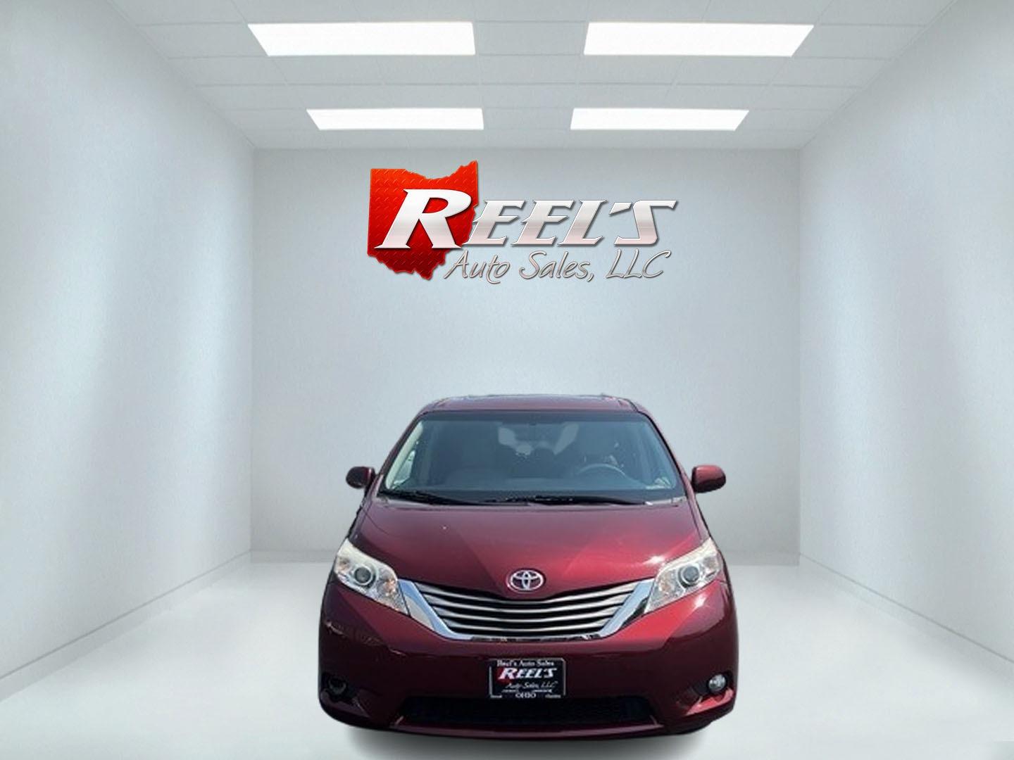 2014 Red /Tan Toyota Sienna (5TDYK3DC2ES) , located at 11115 Chardon Rd. , Chardon, OH, 44024, (440) 214-9705, 41.580246, -81.241943 - This 2014 Toyota Sienna XLE is a versatile and family-friendly minivan equipped with a range of convenience and comfort features. It's powered by a 3.5-liter V6 engine paired with a 6-speed automatic transmission, providing balanced performance for its class. This vehicle's interior comes with a lea - Photo#1