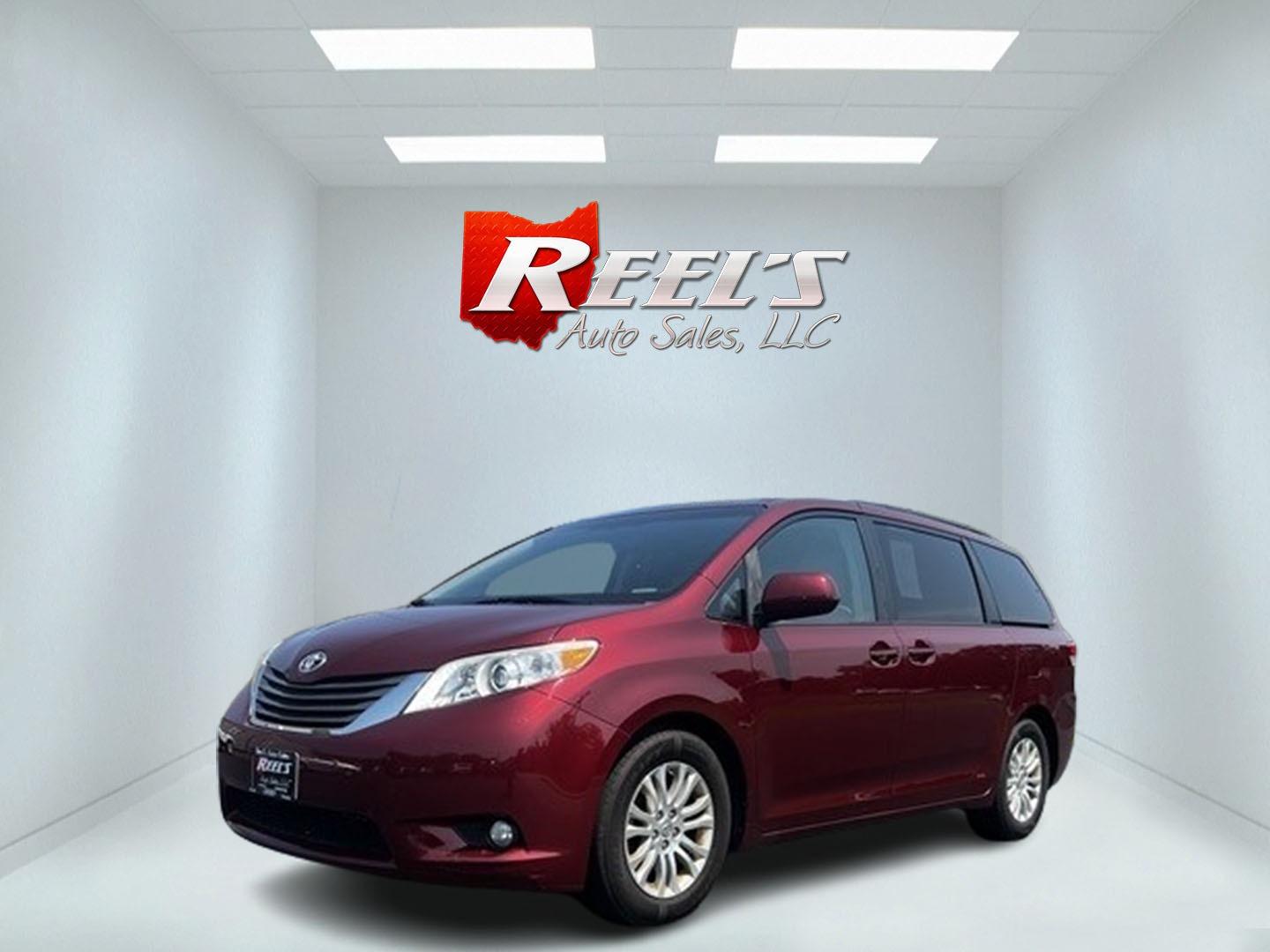 2014 Red /Tan Toyota Sienna (5TDYK3DC2ES) , located at 11115 Chardon Rd. , Chardon, OH, 44024, (440) 214-9705, 41.580246, -81.241943 - This 2014 Toyota Sienna XLE is a versatile and family-friendly minivan equipped with a range of convenience and comfort features. It's powered by a 3.5-liter V6 engine paired with a 6-speed automatic transmission, providing balanced performance for its class. This vehicle's interior comes with a lea - Photo#0