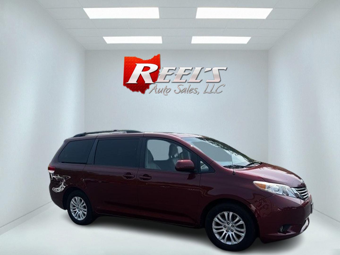 2014 Red /Tan Toyota Sienna (5TDYK3DC2ES) , located at 11115 Chardon Rd. , Chardon, OH, 44024, (440) 214-9705, 41.580246, -81.241943 - This 2014 Toyota Sienna XLE is a versatile and family-friendly minivan equipped with a range of convenience and comfort features. It's powered by a 3.5-liter V6 engine paired with a 6-speed automatic transmission, providing balanced performance for its class. This vehicle's interior comes with a lea - Photo#3